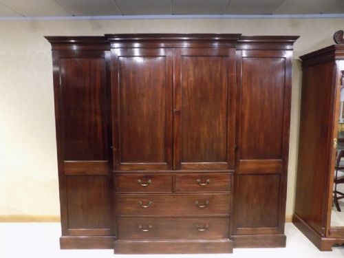 A Mahogany Late Georgian Period Breakfront Wardrobe by Gillows of Lancaster.