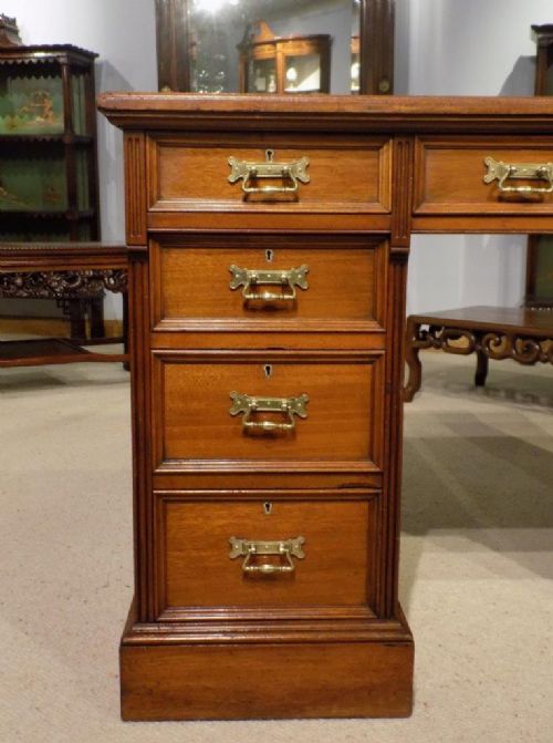 fig 1. A mahogany Late Victorian Period antique pedestal desk by Hindley & Sons of London.