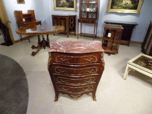 A Superb Quality Rosewood and Ormolu Mounted French Marble Top Chest.