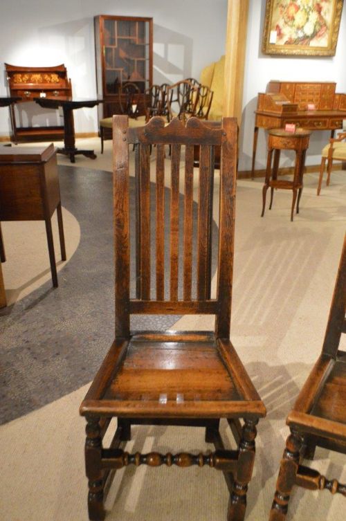 fig 1. A pair of oak 17th Century antique hall chairs