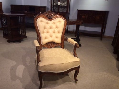 A Carved Walnut Victorian Period Antique Armchair