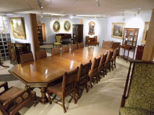 A Fantastic & Rare Pollard Oak and Ebony Dining Room Table with 14 Matching Chairs
