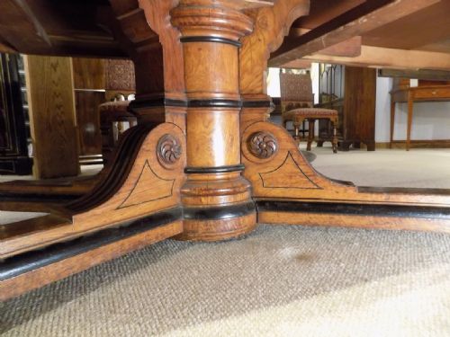 fig 3. A fantastic & rare Pollard oak and ebony dining room table with 14 matching chairs