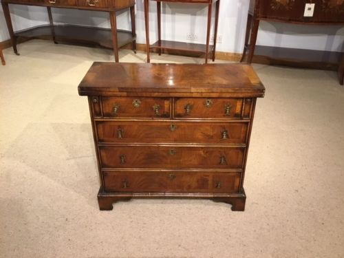 A Walnut Queen Anne Style Bachelors Chest.