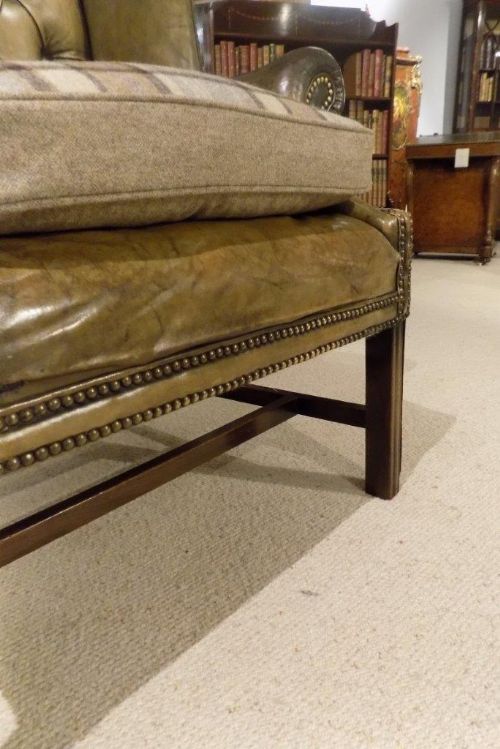 fig 1. A good leather George III Style wing armchair