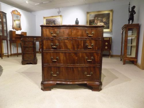 A Mahogany Chippendale Revival Edwardian Period Serpentine Chest of Drawers.
