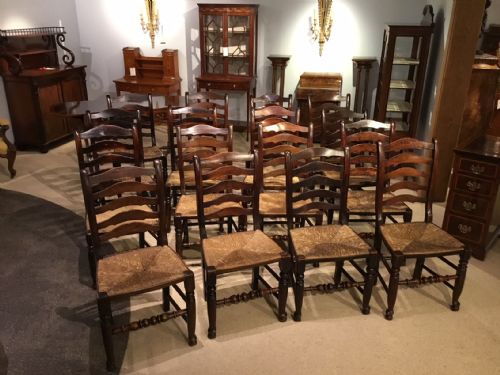 A Rare Set of 16 Ash and Elm Mid 19th Century "Ormskirk" Ladder Back Chairs