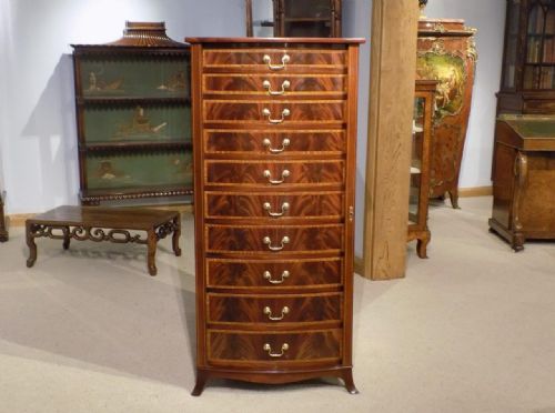 A Beautiful Mahogany Inlaid Edwardian Period Bow Front Wellington Chest