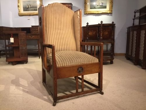 An Arts & Crafts Period Oak Winged Armchair Possibly by George Montague Ellwood