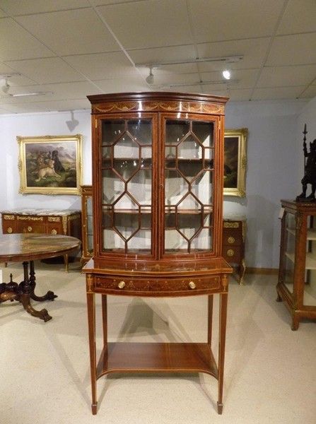 A Superb Quality Mahogany & Marquetry Inlaid Bow Front Display Cabinet on Stand.