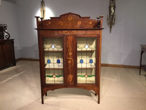 A Mahogany and Marquetry Inlaid Arts & Crafts Period Display Cabinet
