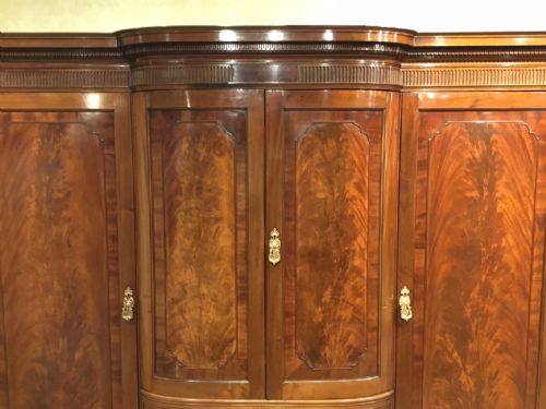 fig 1. A mahogany Edwardian Period breakfront wardrobe by Howard & Sons Of London