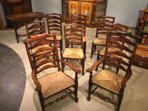fig 1. A harlequin set of 8 Early 19th Century ash and elm ladder back kitchen dining chairs