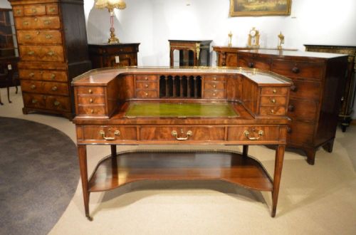 A Fine Quality George III Style Flamed Mahogany Carlton House Desk