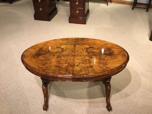 An Unusual Burr Walnut and Walnut Victorian Period Oval Coffee Table with Slide