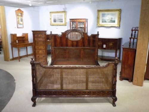 A Beautifully Carved Mahogany Edwardian Period Double Bed in the French Taste.