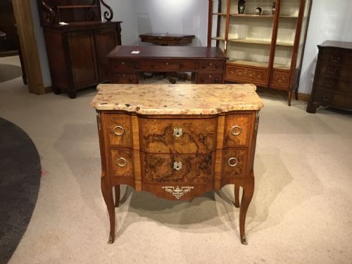 A Fine Quality Burr Walnut Brass Mounted Louis Xvi Style Marble Top Commode.