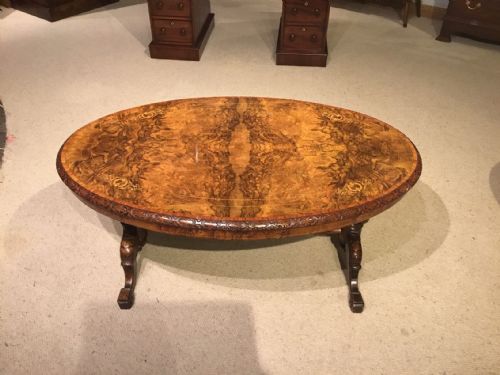 An Oval Burr Walnut and Marquetry Inlaid Victorian Period Coffee Table
