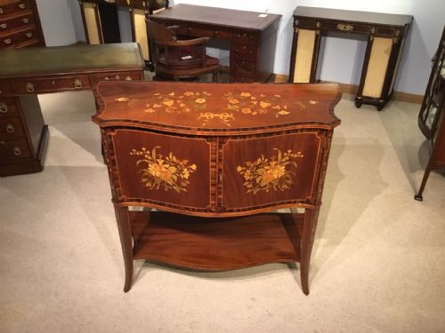 A Serpentine Shaped Edwardian Period Marquetry Inlaid Side Cabinet.