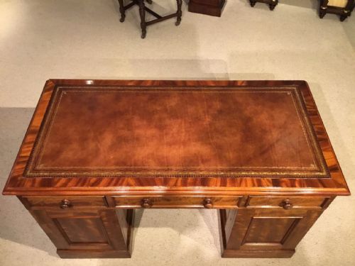 fig 1. A figured mahogany Victorian Period antique writing desk.
