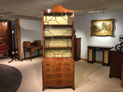 A Flame Mahogany George III Style Antique Cabinet/bookcase.