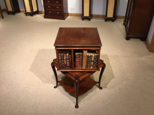 A Mahogany Edwardian Period Revolving Bookcase by James Shoolbred of London.
