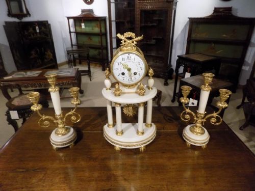 A French White Marble & Ormolu Clock Garniture