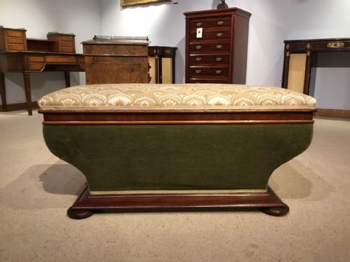 A Mahogany Victorian Period Sarcophagus Shaped Ottoman