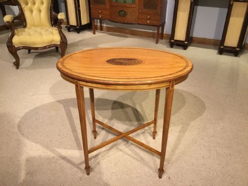 An Edwardian Period Satinwood Oval Occasional Table