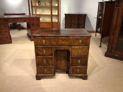 A Small Queen Anne Style Burr Walnut Knee Hole Desk