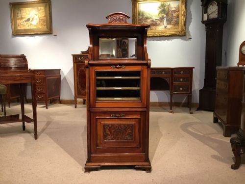 A Walnut Late Victorian Period Music Cabinet