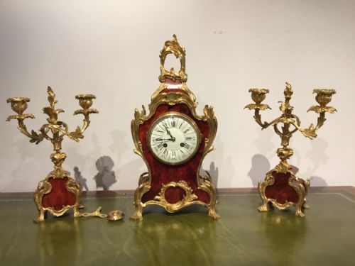 A Beautiful Late 19th Century French Tortoiseshell and Ormolu Clock Garniture.