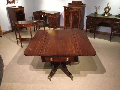 A Regency Period Cuban Mahogany Antique Pembroke Table.