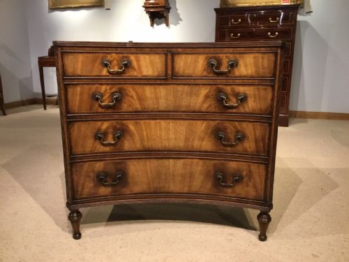 A Regency Style Flame Mahogany Concave Shaped Antique Chest of Drawers.