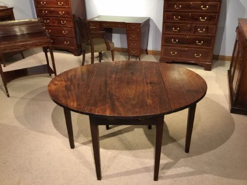 A Mahogany George III Period Pembroke Table.