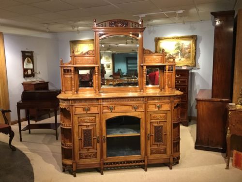 A Walnut Aesthetic Period Chiffonier by Ogdens of Manchester.