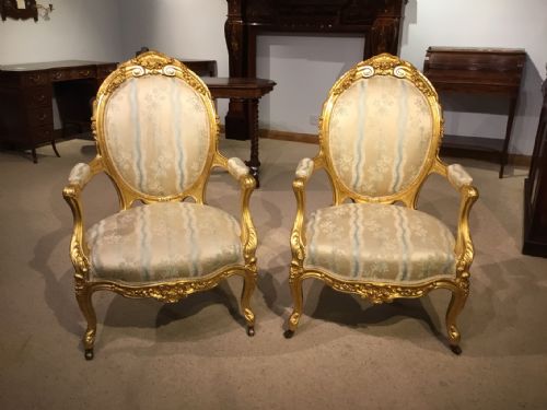 A Pair of 19th Century Carved and Gilded Fauteuils