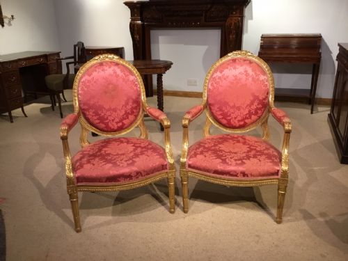 A Pair of Louis Xvi Style Carved Gilt-wood Fauteuils