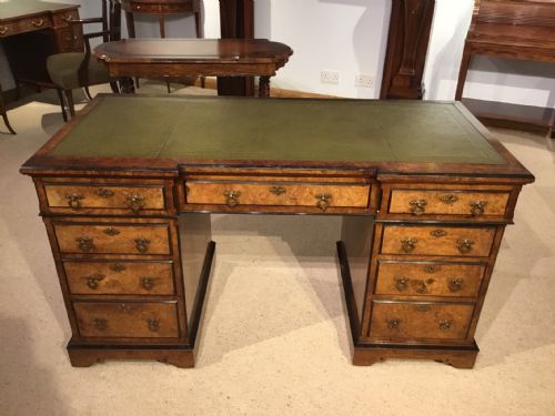 A Burr Walnut Victorian Aesthetic Period Antique Desk.