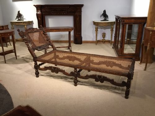 A Late 17th Century Style Walnut & Cane Antique Day Bed.