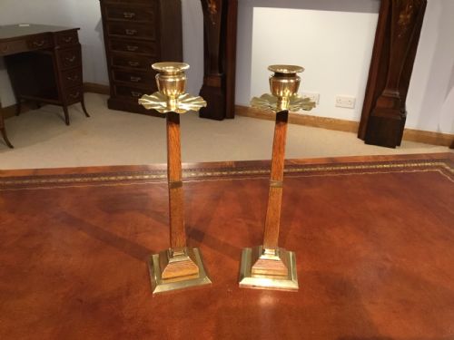 A Lovely Pair of Arts & Crafts Period Oak and Brass Candle Sticks.