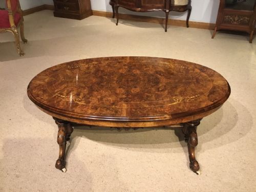 A Burr Walnut Victorian Period Antique Oval Coffee Table.