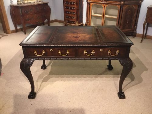 A Mahogany Chippendale Revival Writing Table by Maple & Co of London