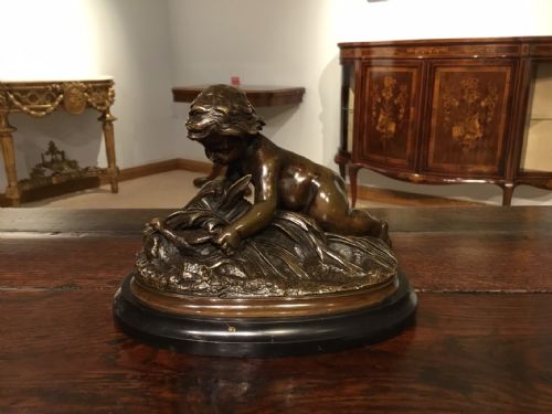 A Charming French Bronze Group Depicting a Cherub