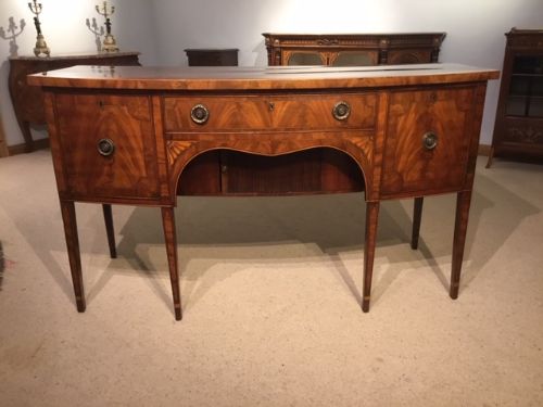 A Mahogany George III Period Bow Front Sideboard.