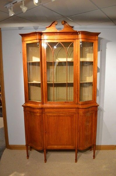 A Satinwood Edwardian Period Serpentine Antique Display Cabinet by Maple & Co