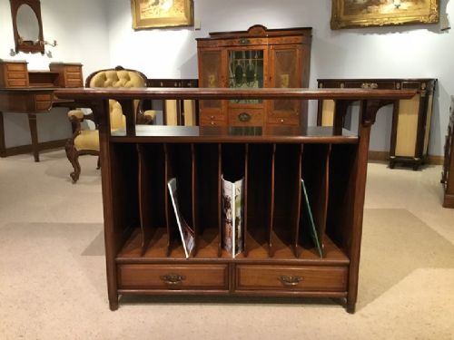 A Late Victorian Period Aesthetic Walnut Magazine Stand