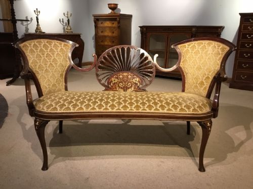 fig 1. A mahogany and marquetry inlaid Edwardian Period settee