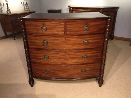 A Mahogany Regency Period Bow Front Chest of Drawers by London Cabinet Maker George Simpson