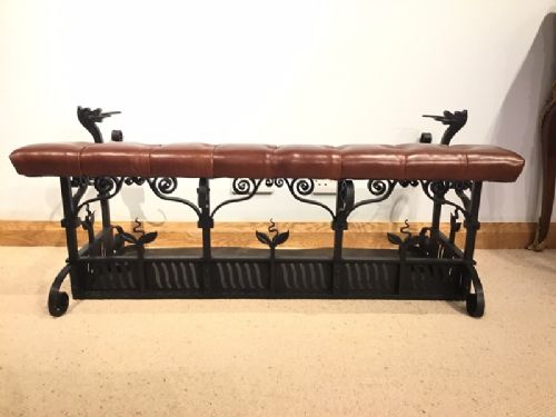 A 19th Century Aesthetic Period Wrought Iron and Leather Club Fender